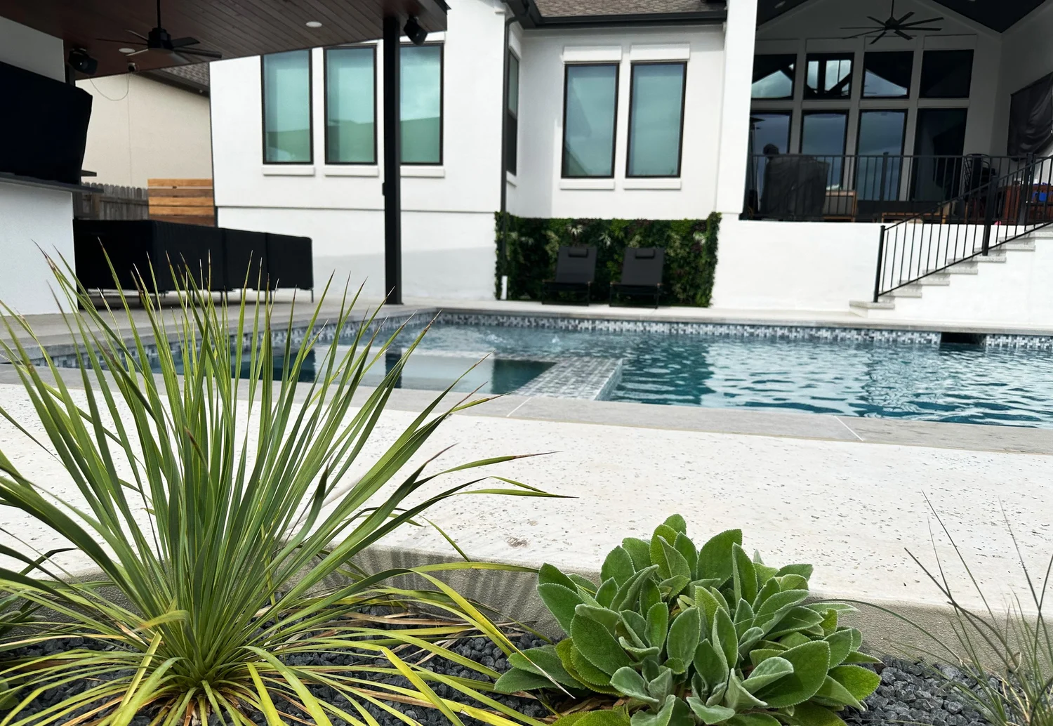 Finished Pool Sharp backyard with deck and pool
