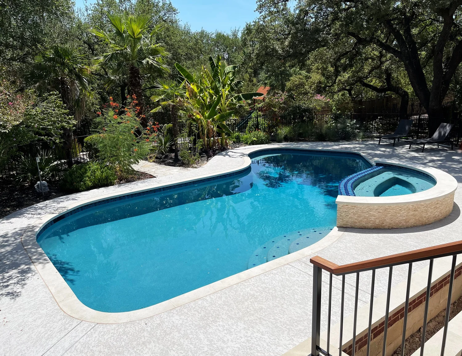 Pool Sharp project with custom stonework and seating