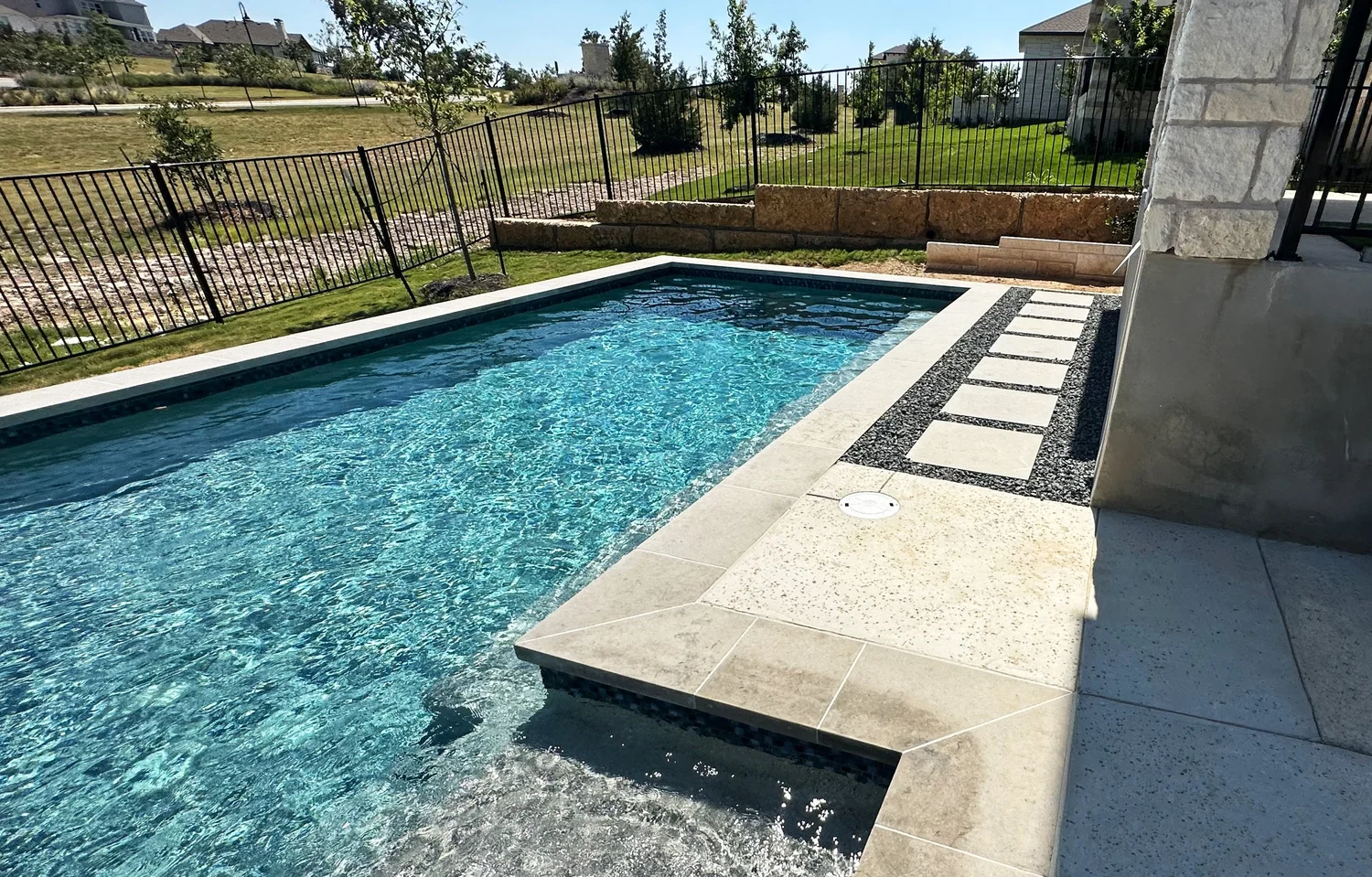Pool Sharp water feature and deck detail